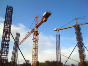 Construction site with cranes for a business premises fit-out