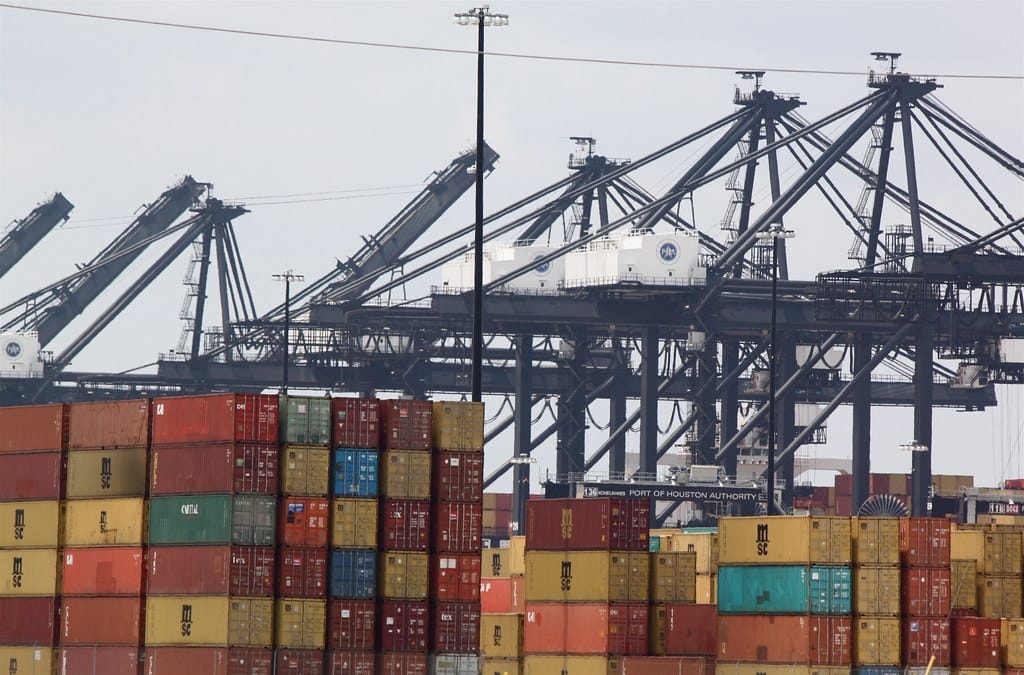 Container terminal cranes handling shipping at a free zone port