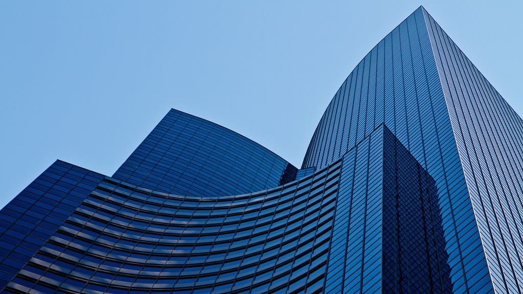 Modern bank tower representing business banking in Qatar