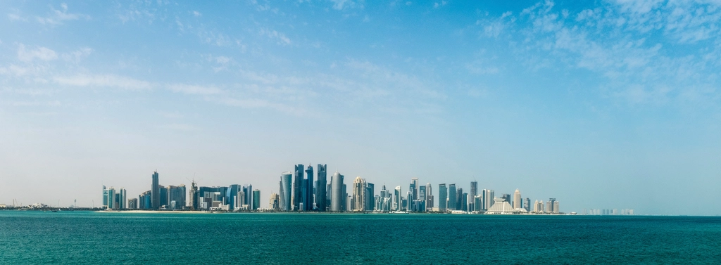 Doha West Bay skyline in Qatar, where mainland and free zone businesses are registered