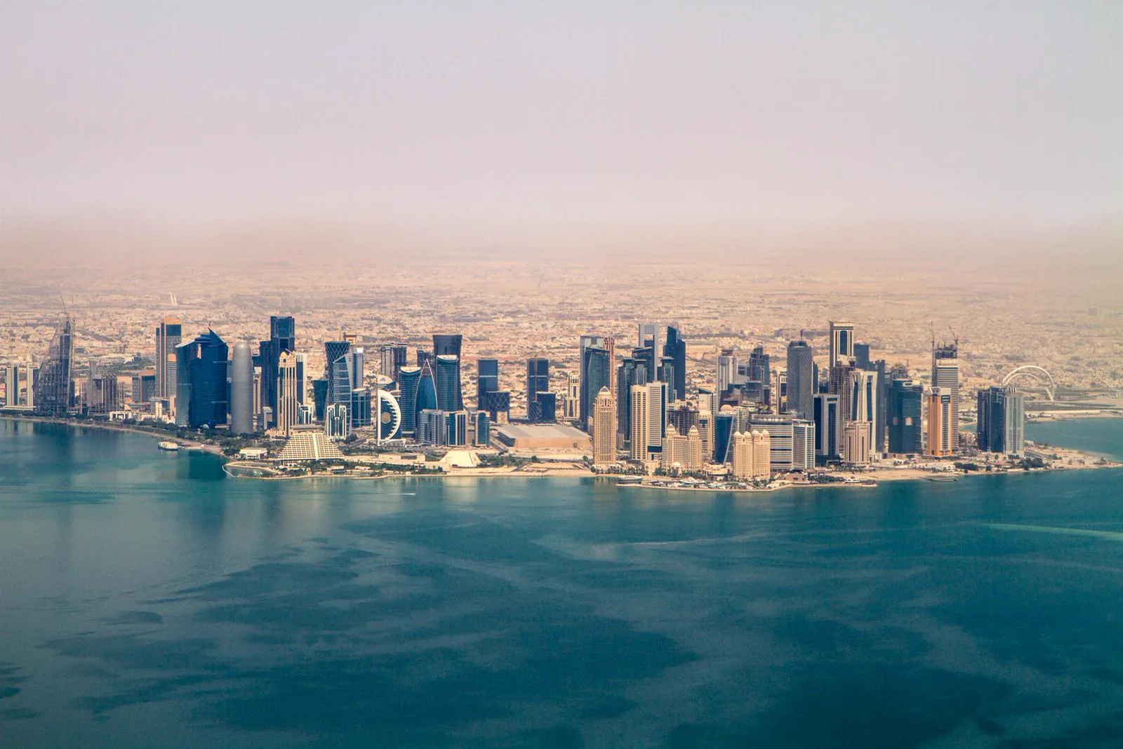 Aerial view of Doha business district skyscrapers on a clear day